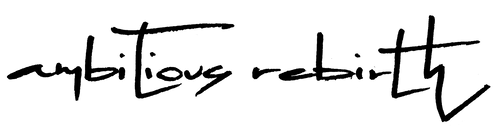 Black handwritten-style script reading 'ambitious rebirth' on a plain white background.
